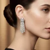 731-silver-finish-art-deco-inspired-earrings-with-baguette-style-accents-1.webp Silver Finish Art Deco Inspired Earrings With Baguette Style Accents