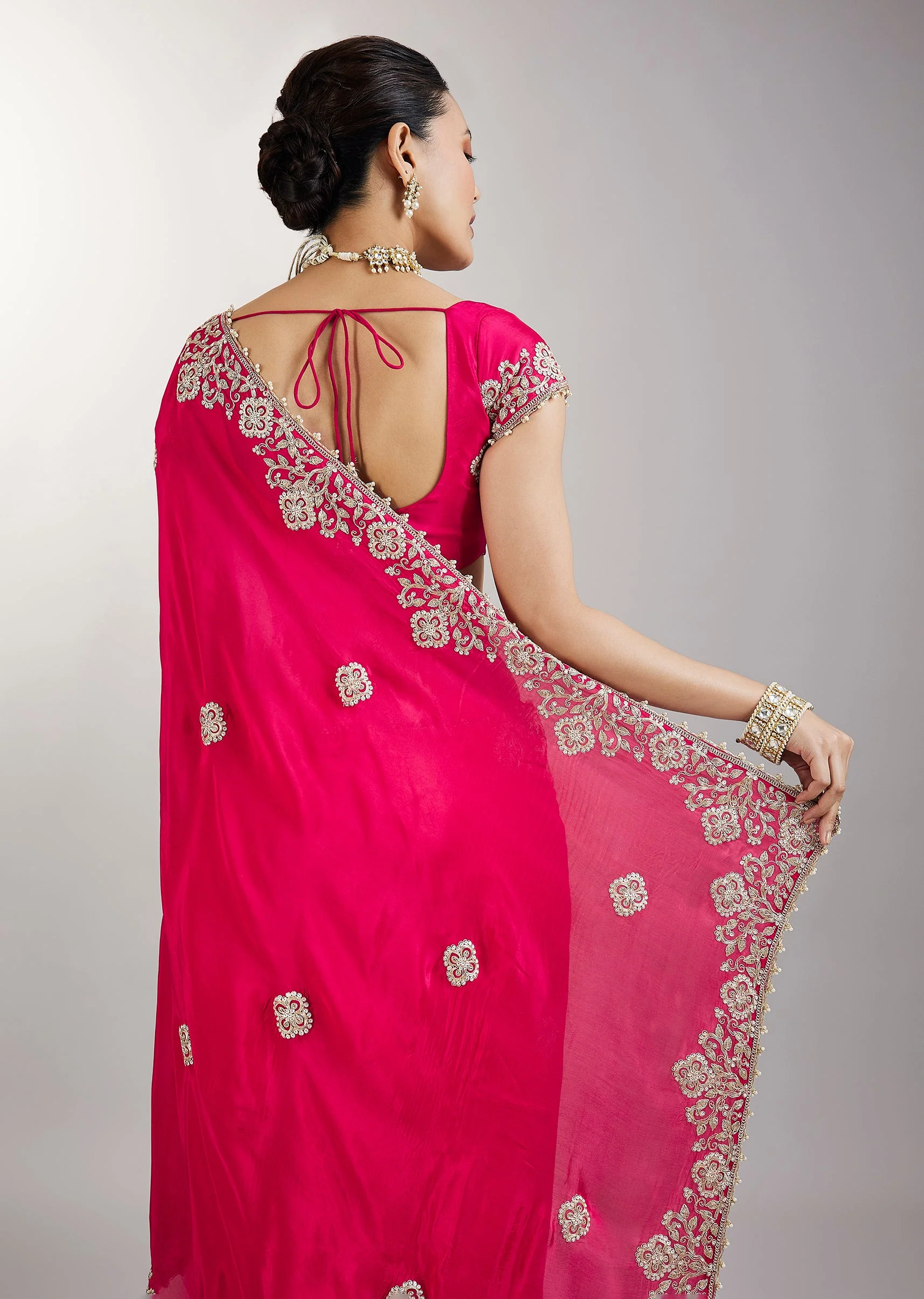 Rani Pink Embroidered Crepe Saree