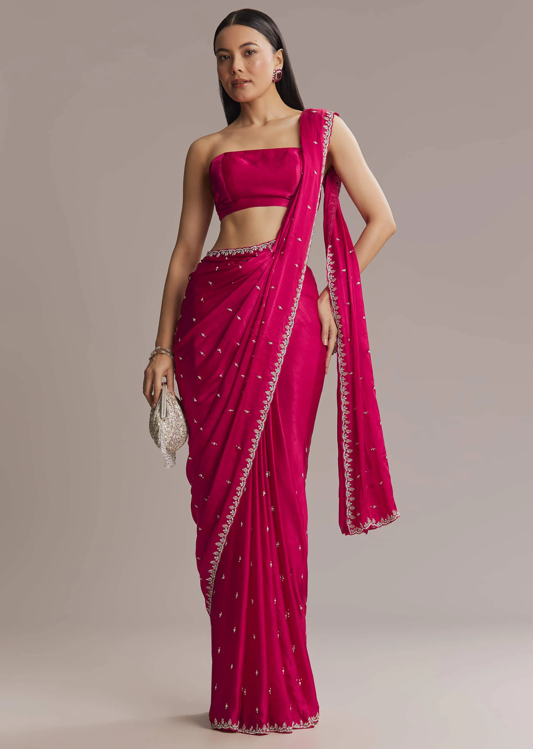 7502-hot-pink-chinon-saree-with-cutdana-and-stone-embroidery-1.webp Hot Pink Chinon Saree With Cutdana And Stone Embroidery