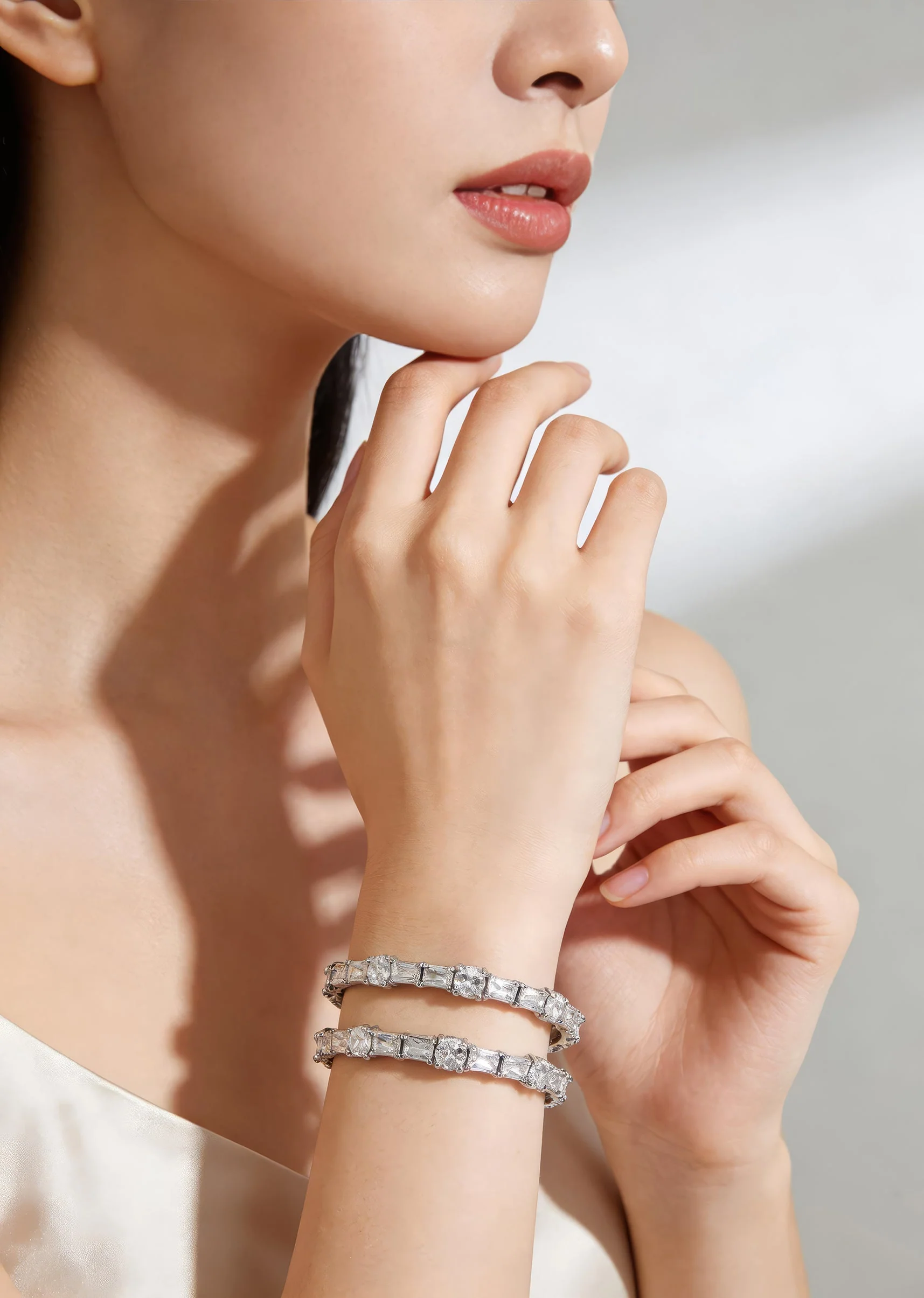 Silver Plated Dual Row Bracelet With Round Cut Stones