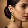 8443-gold-finish-jhumka-earrings-in-mix-metal-with-floral-stud-and-green-and-white-bead-tassels-1.webp Gold Finish Jhumka Earrings In Mix Metal With Floral Stud And Green and White Bead Tassels