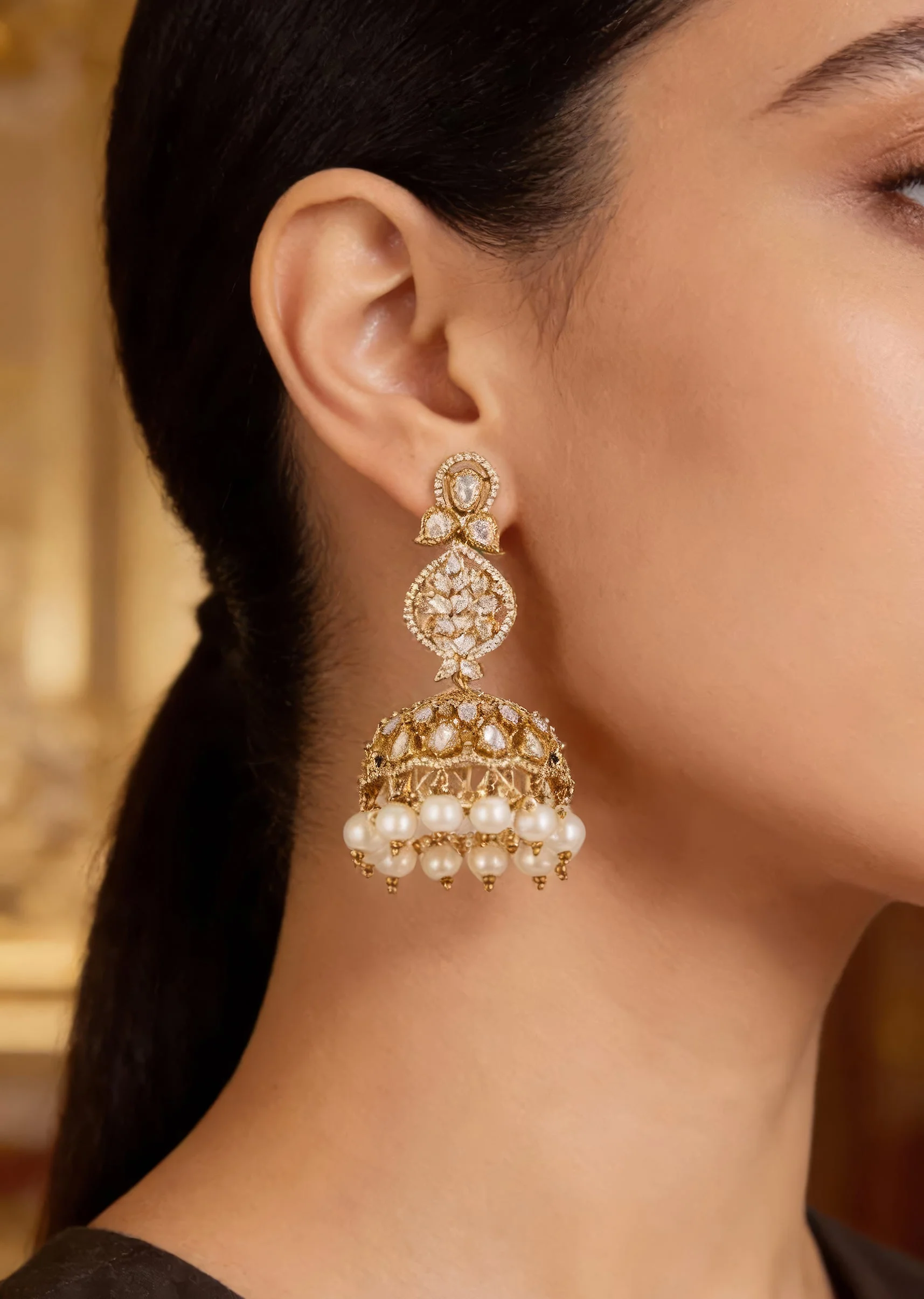 8444-gold-finish-jhumkas-in-polki-with-off-white-simulated-pearls-and-clear-polki-style-stones-1.webp Gold Finish Jhumkas In Polki With Off White Simulated Pearls and Clear Polki Style Stones