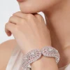 8451-silver-finish-bracelet-in-mix-metal-with-modern-rose-style-and-light-pink-cubic-zirconia-accents-1.webp Silver Finish Bracelet In Mix Metal With Modern Rose Style And Light Pink Cubic Zirconia Accents