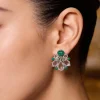 8453-silver-finish-whimsical-floral-stud-earrings-with-green-carved-stone-and-clear-pear-cut-simulated-stones-1.webp Silver Finish Whimsical Floral Stud Earrings With Green Carved Stone and Clear Pear Cut Simulated Stones