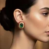 8456-gold-finish-oval-stud-earrings-with-large-green-center-stone-and-red-cabochon-stone-border-1.webp Gold Finish Oval Stud Earrings With Large Green Center Stone and Red Cabochon Stone Border