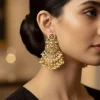 8459-gold-toned-earrings-in-drop-style-with-kundan-and-multi-stone-and-pearl-detailing-1.webp Gold Toned Earrings In Drop Style With Kundan And Multi Stone And Pearl Detailing