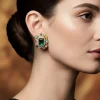 8462-gold-finish-rectangular-statement-earrings-with-faceted-green-stone-white-cz-halo-and-navratna-dome-cut-border-1.webp Gold Finish Rectangular Statement Earrings With Faceted Green Stone White Cz Halo And Navratna Dome Cut Border
