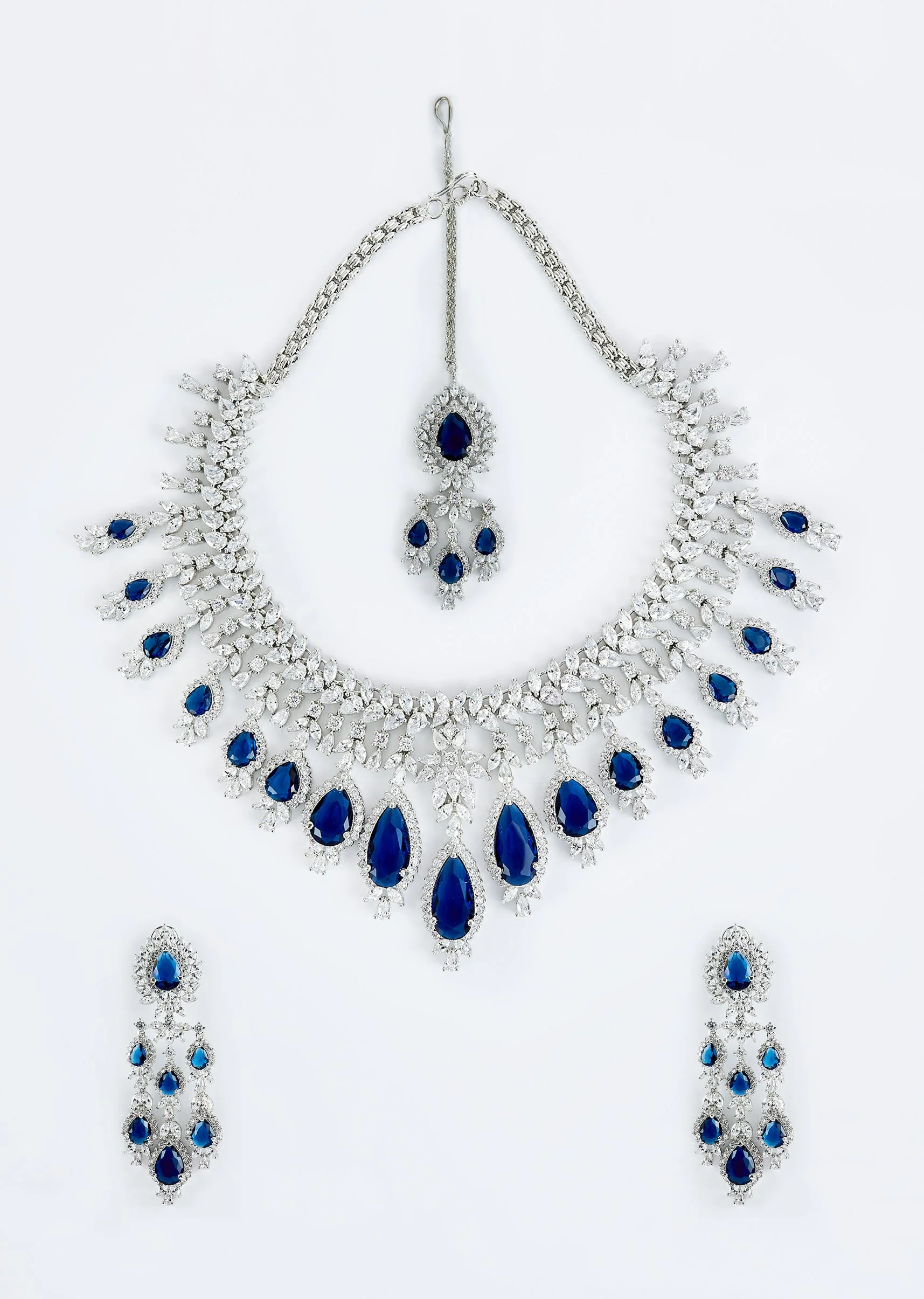 Silver Plated Blue Zircon Short Necklace Set With Dangler Earrings And Maangtikka