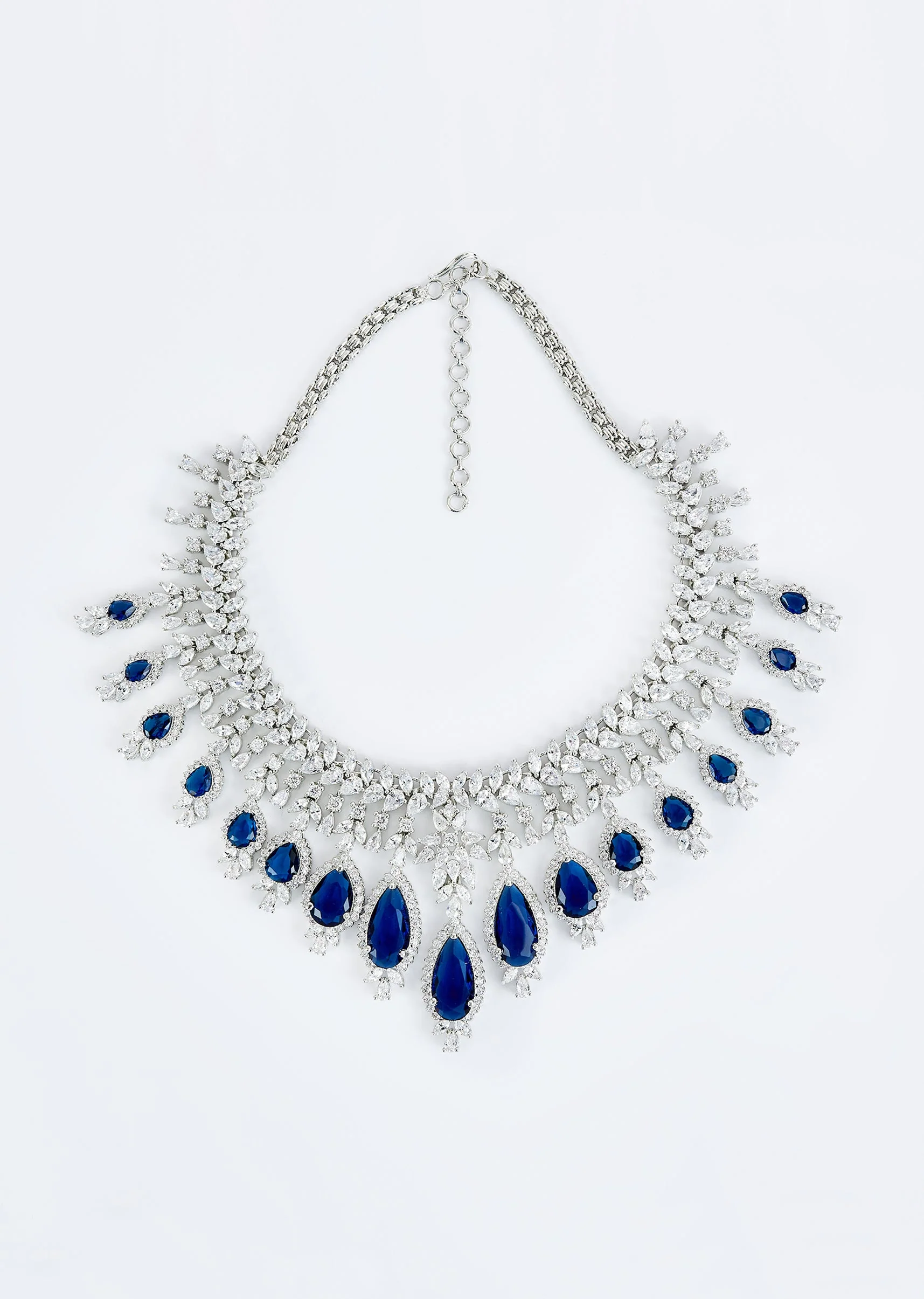 Silver Plated Blue Zircon Short Necklace Set With Dangler Earrings And Maangtikka