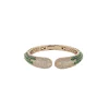 Gold Finish Bracelet In Mix Metal With Modern Cuff Style And Green Simulated Emerald And Cubic Zirconia Accents