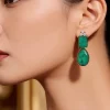 8494-silver-finish-drop-earrings-with-emerald-cut-and-teardrop-accents-and-green-simulated-stones-1.webp Silver Finish Drop Earrings With Emerald Cut and Teardrop Accents And Green Simulated Stones