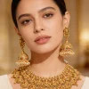 8497-gold-finish-necklace-set-with-traditional-temple-motifs-and-pink-green-and-white-simulated-stones-1.webp Gold Finish Necklace Set With Traditional Temple Motifs And Pink Green and White Simulated Stones