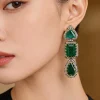 Silver Plated Green Stone Danglers With Crystals Around