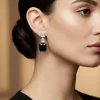 8505-silver-finish-earrings-in-mix-metal-with-modern-pendant-style-and-violet-simulated-onyx-accents-1.webp Silver Finish Earrings In Mix Metal With Modern Pendant Style And Violet Simulated Onyx Accents