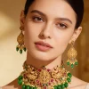 8507-gold-finish-necklace-set-with-intricate-traditional-temple-motifs-and-pink-and-green-simulated-stones-1.webp Gold Finish Necklace Set With Intricate Traditional Temple Motifs And Pink and Green Simulated Stones