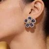 Silver Finish Floral Cluster Stud Earrings With Blue Simulated Stones and Clear Accents
