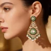 8511-gold-finish-chandelier-earrings-in-polki-with-simulated-pearls-and-green-beaded-accents-1.webp Gold Finish Chandelier Earrings In Polki With Simulated Pearls and Green Beaded Accents