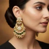 8516-gold-finish-earrings-in-chandelier-style-with-kundan-and-green-stone-and-pearl-detailing-1.webp Gold Finish Earrings In Chandelier Style With Kundan And Green Stone And Pearl Detailing