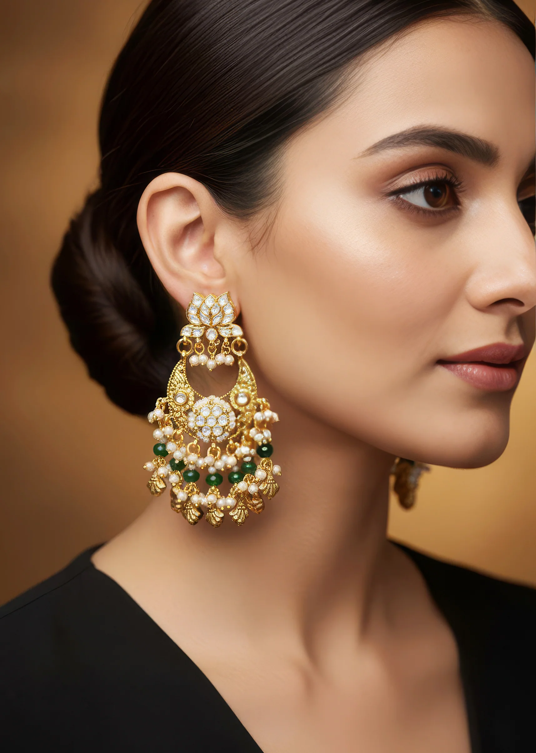 8516-gold-finish-earrings-in-chandelier-style-with-kundan-and-green-stone-and-pearl-detailing-1.webp Gold Finish Earrings In Chandelier Style With Kundan And Green Stone And Pearl Detailing