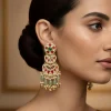 8518-gold-finish-three-tiered-chandbali-earrings-with-kundan-work-red-enamel-accents-moti-beads-and-green-hanging-stones-1.webp Gold Finish Three Tiered Chandbali Earrings With Kundan Work Red Enamel Accents Moti Beads And Green Hanging Stones