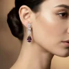 8525-silver-finish-earrings-in-mix-metal-with-modern-pendant-style-and-purple-simulated-stone-accents-1.webp Silver Finish Earrings In Mix Metal With Modern Pendant Style And Purple Simulated Stone Accents