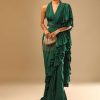 Emerald Green Ready Pleated Ruffle Saree With A Halter Neck Blouse And 3D Embroidered Belt
