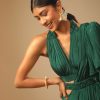 Emerald Green Ready Pleated Ruffle Saree With A Halter Neck Blouse And 3D Embroidered Belt