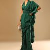 Emerald Green Ready Pleated Ruffle Saree With A Halter Neck Blouse And 3D Embroidered Belt