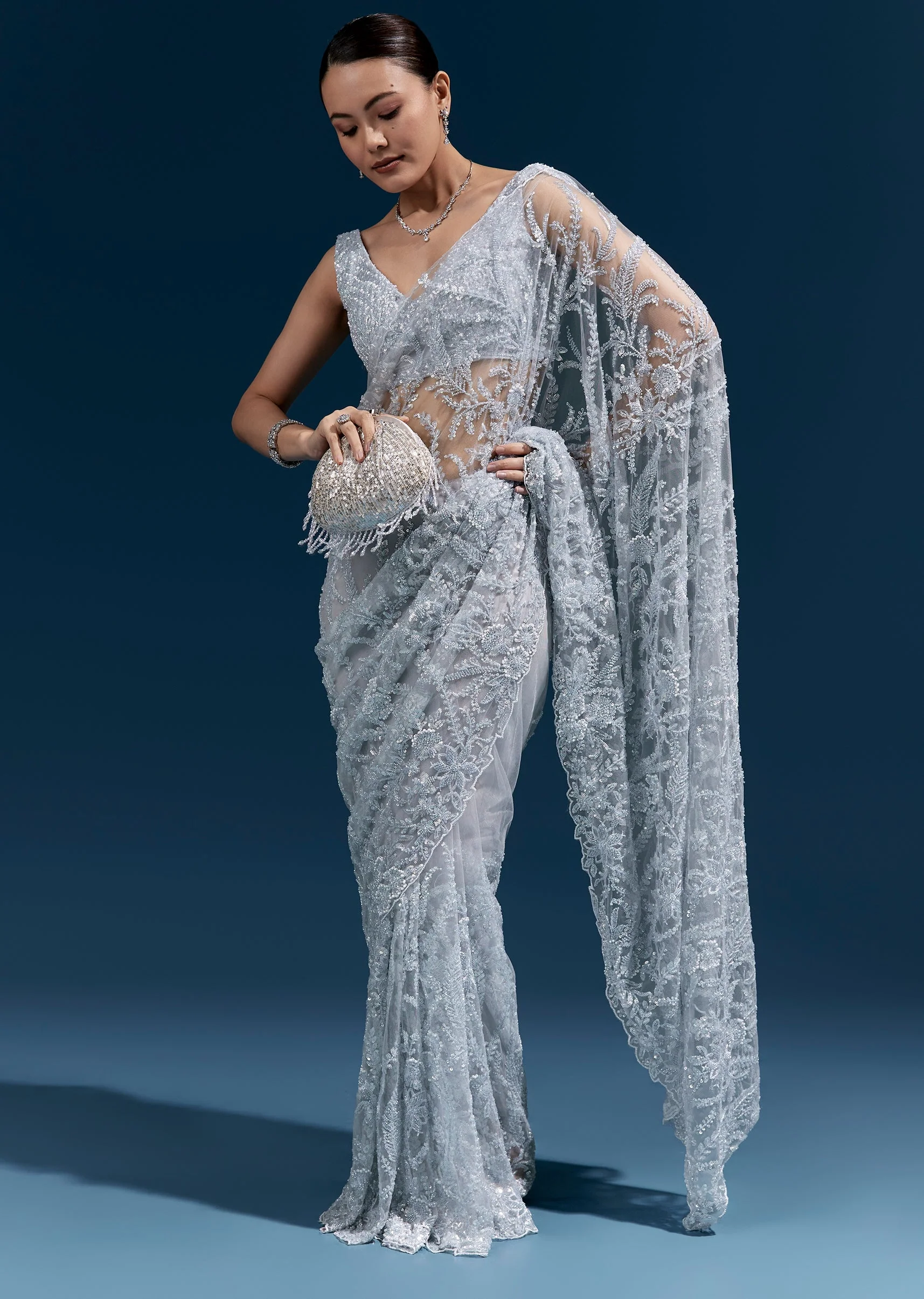 Ice Blue Heavy Embroidered Net Saree With Cutwork Border And All Over Floral Jaal
