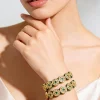 Gold Toned Green Stone And Pearl Embellished Bangles