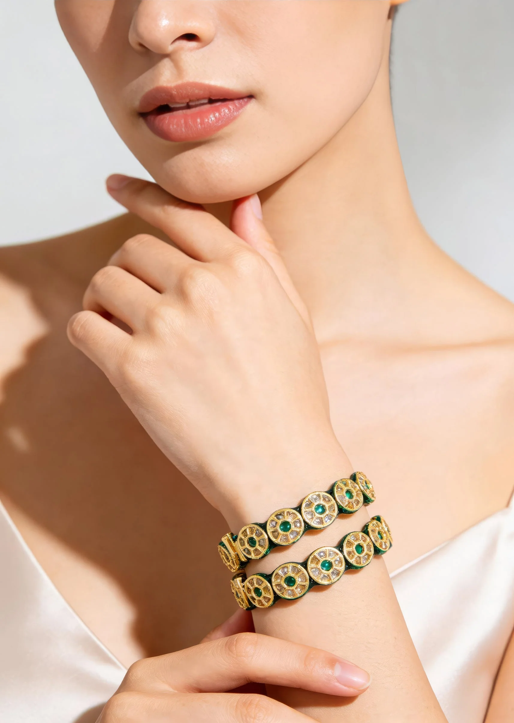 Gold Toned Green Stone And Pearl Embellished Bangles