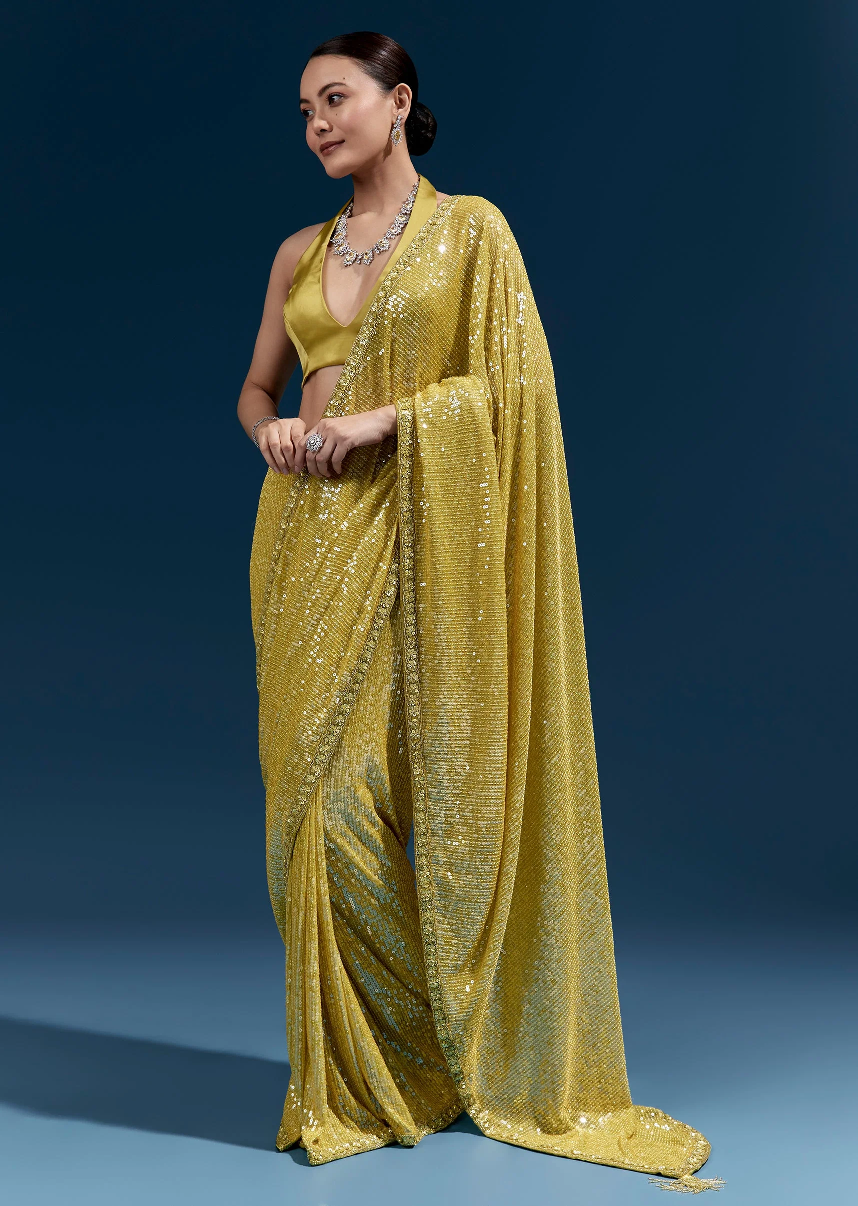 Yellow Net Sequin Saree With Linear All Over Work And Hand Embroidered Floral Border