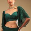 Emerald Green Ready Pleated Saree In Georgette With Bell Sleeves Crop Top And Chunky Embroidered Belt