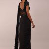 8678-us-12-us-12-variation-5.jpg Pitch Black Saree With Three Tones Of Layered Frills On The Bottom Embellished In Stones And Sequins With A Tassel On The Pallu Corner