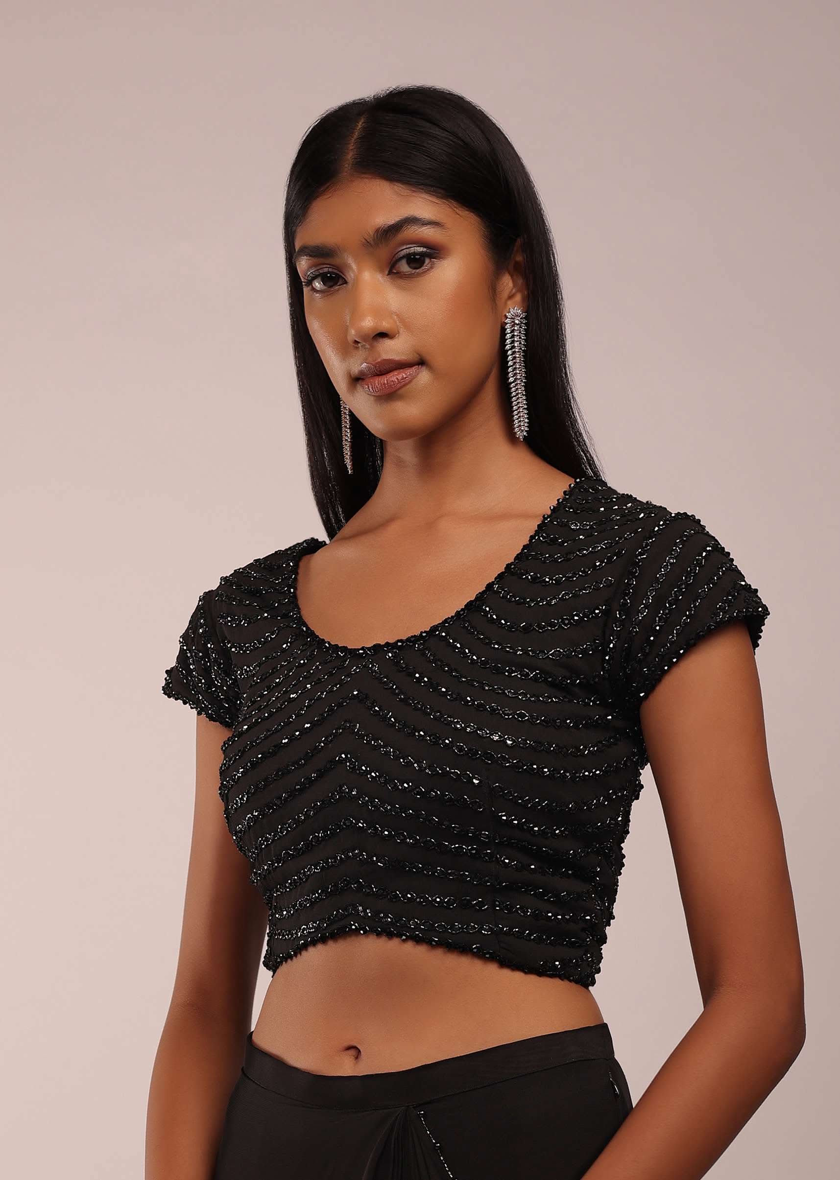 8678-us-12-us-12-variation-6.jpg Pitch Black Saree With Three Tones Of Layered Frills On The Bottom Embellished In Stones And Sequins With A Tassel On The Pallu Corner