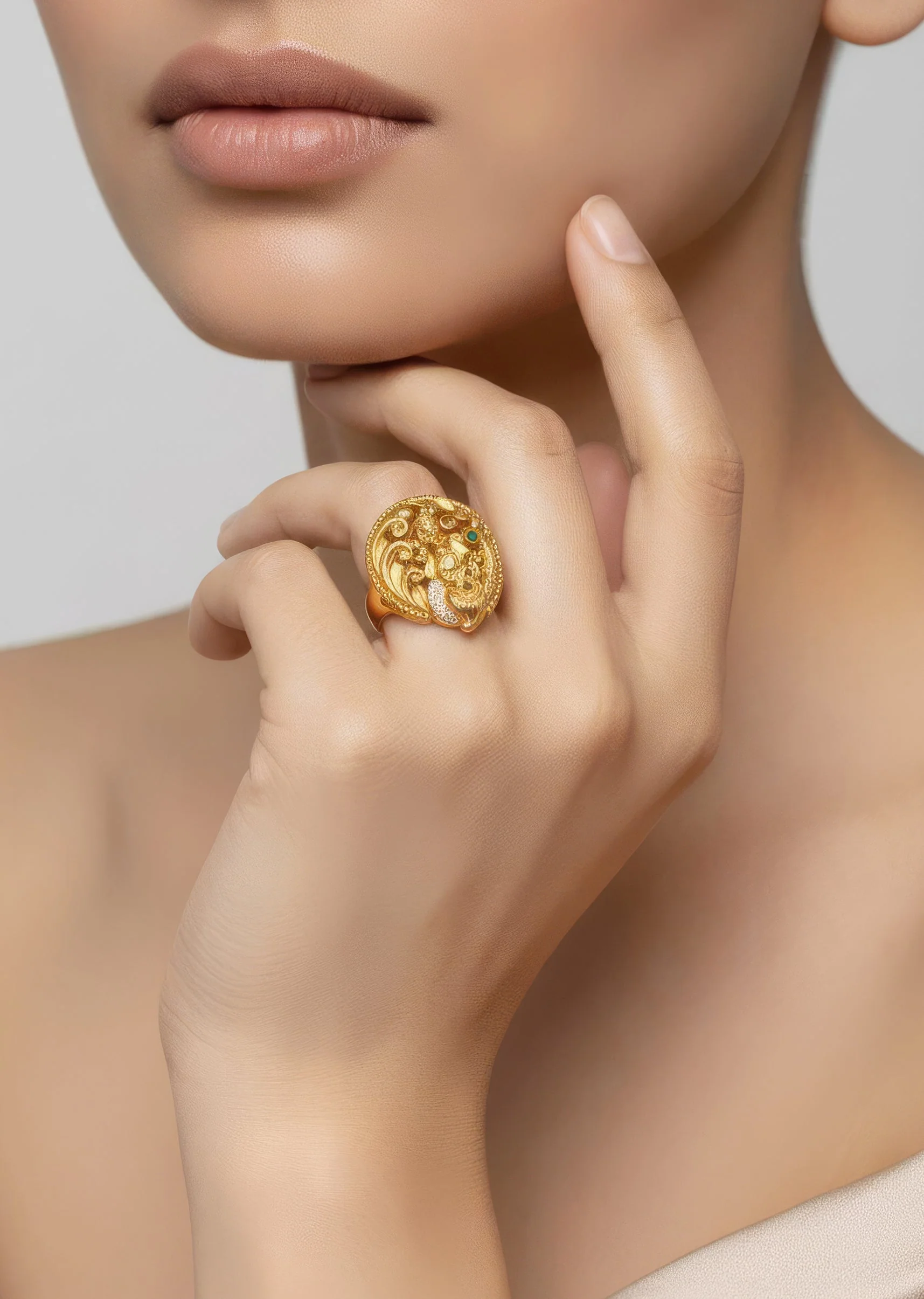 895-gold-finish-ring-with-temple-style-motifs-and-green-simulated-stones-1.webp Gold Finish Ring With Temple Style Motifs And Green Simulated Stones
