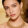 896-gold-toned-temple-style-jewellery-set-with-pink-and-green-simulated-stones-1.webp Gold Toned Temple Style Jewellery Set With Pink and Green Simulated Stones