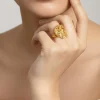 897-gold-finish-ring-with-temple-style-motifs-and-pink-and-white-simulated-stones-1.webp Gold Finish Ring With Temple Style Motifs And Pink and White Simulated Stones