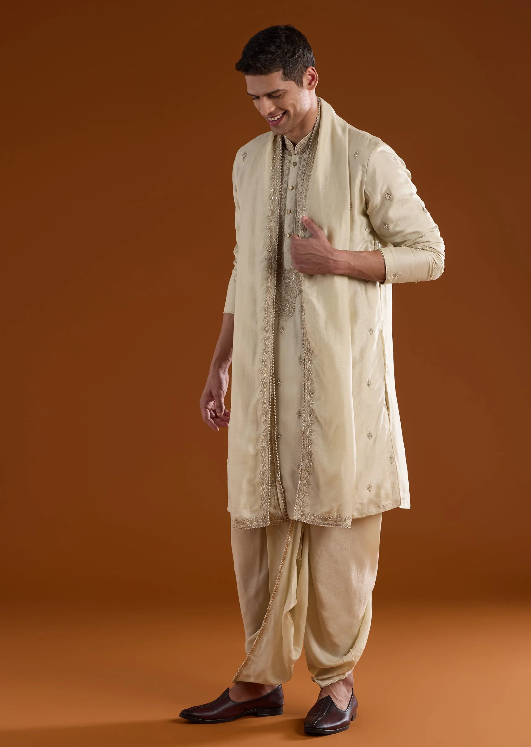 9119-silk-beige-kurta-dhoti-set-with-moti-and-sequins-work-for-muhurtham-1.webp Silk Beige Kurta Dhoti Set With Moti And Sequins Work for Muhurtham
