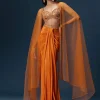 Rust Dhoti Skirt Set With Embellished Blouse And Tassel Net Dupatta