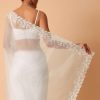White Saree In Organza With Floral Motif Border And Unstitched Blouse Piece