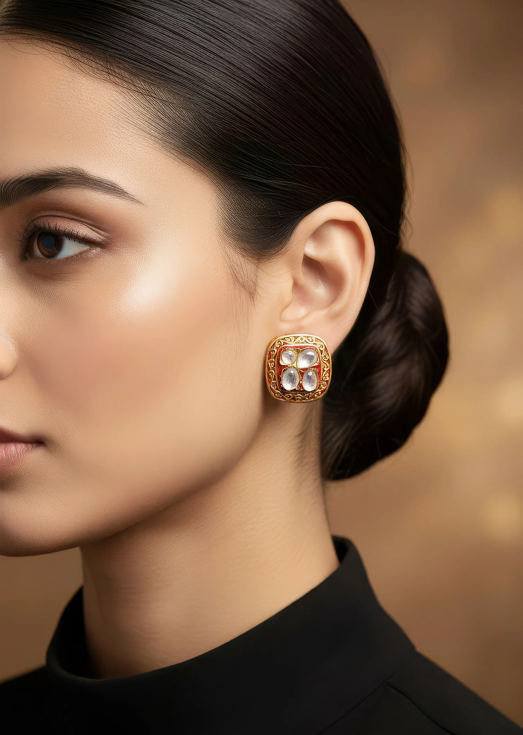 930-gold-toned-earrings-in-stud-style-with-enamel-stone-detailing-1.webp Gold Toned Earrings In Stud Style With Enamel Stone Detailing