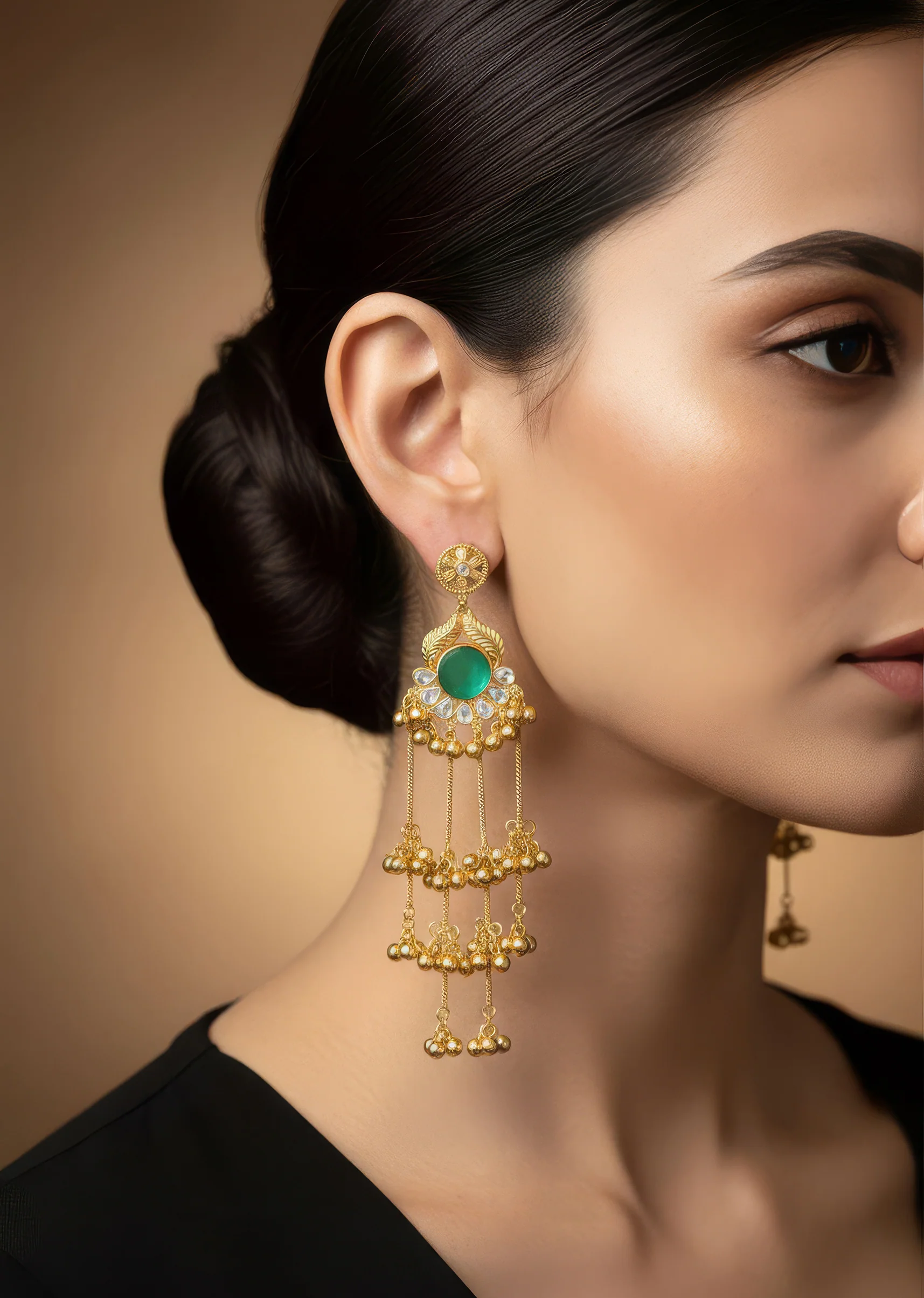 933-gold-finish-statement-jhumkas-for-festive-wear-1.webp Gold Finish Statement Jhumkas for Festive Wear