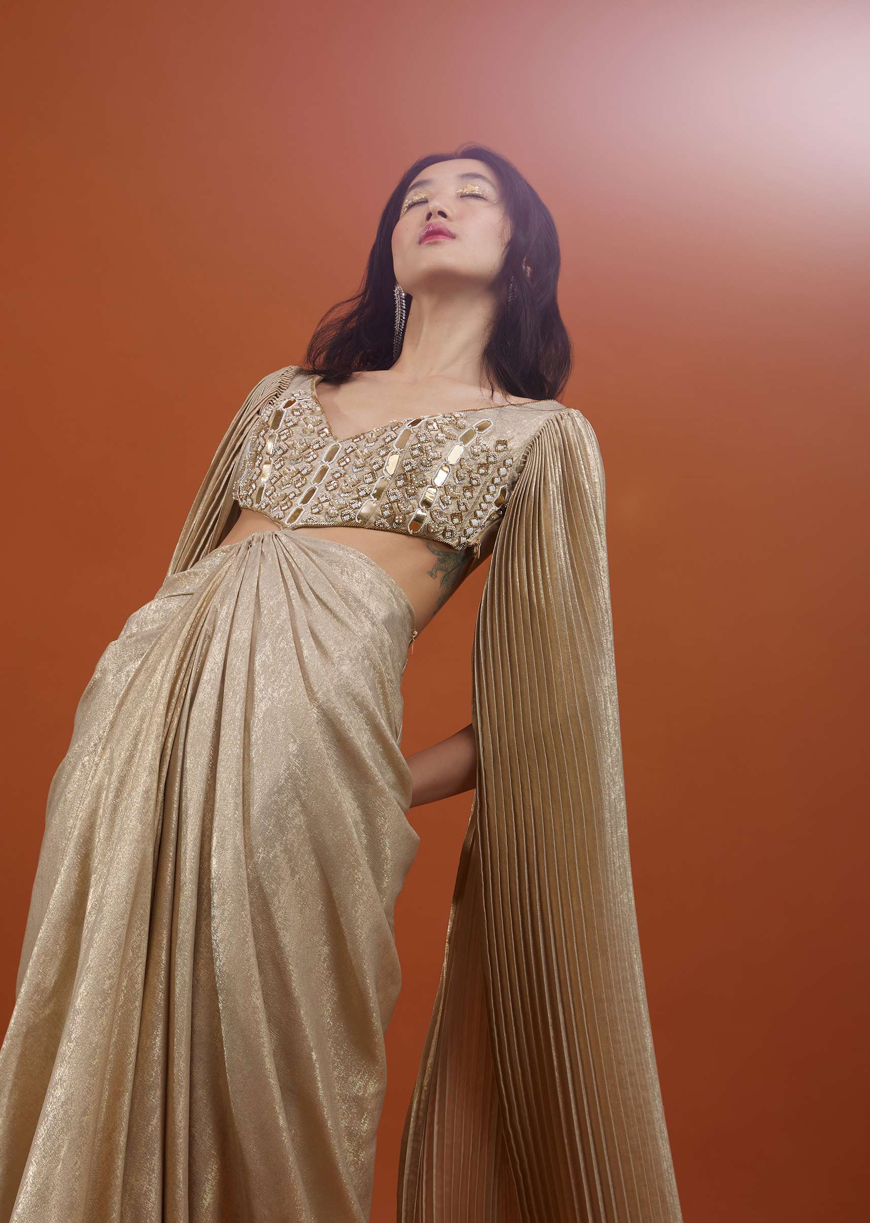 Mocha Brown Gown With A Pre-Pleated Dhoti Skirt Area And Royal Cape Sleeves- NOOR 2022