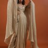 Mocha Brown Gown With A Pre-Pleated Dhoti Skirt And Royal Cape Sleeves - NOOR 2022