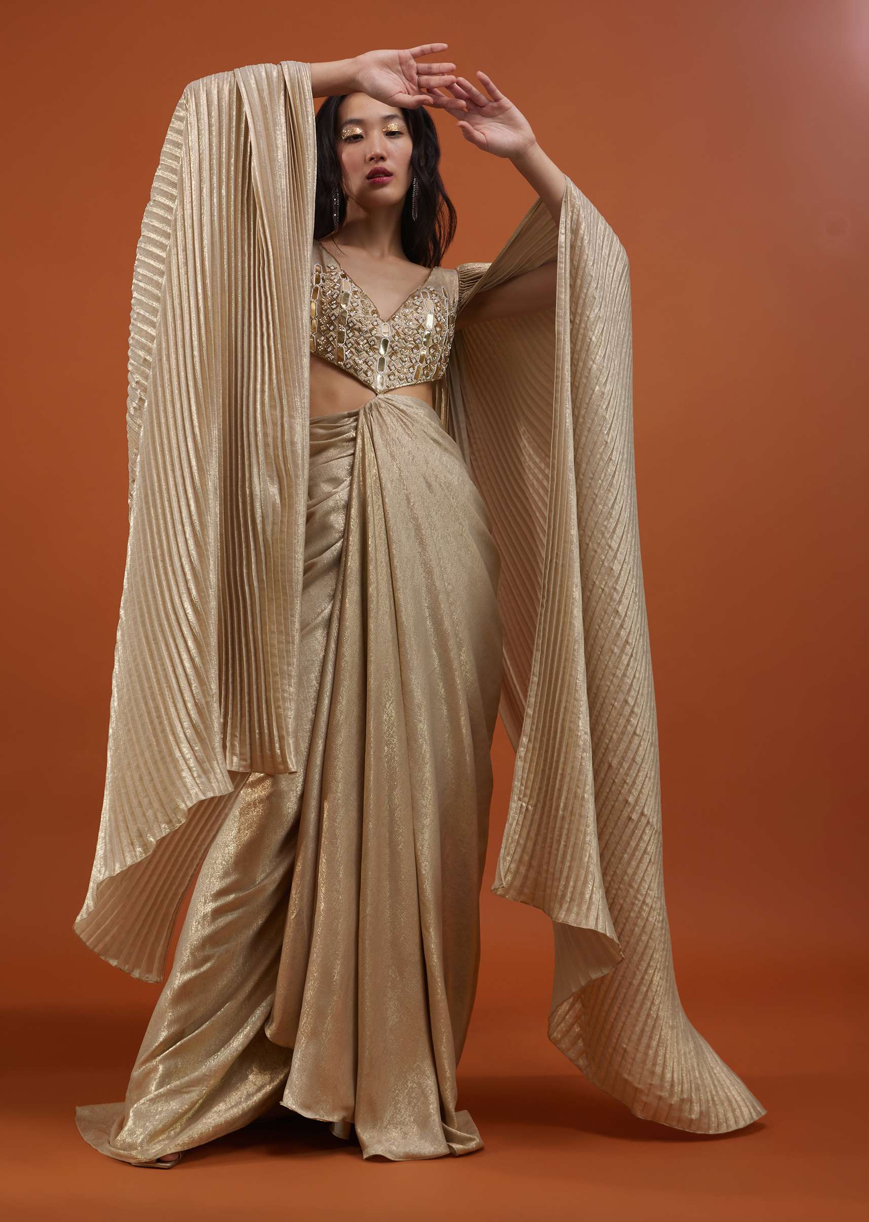 Mocha Brown Gown With A Pre-Pleated Dhoti Skirt And Royal Cape Sleeves - NOOR 2022