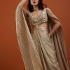 Mocha Brown Gown With A Pre-Pleated Dhoti Skirt And Royal Cape Sleeves - NOOR 2022