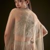 Beige Drape Dhoti Skirt With Embroidered Bustier And Long Cape