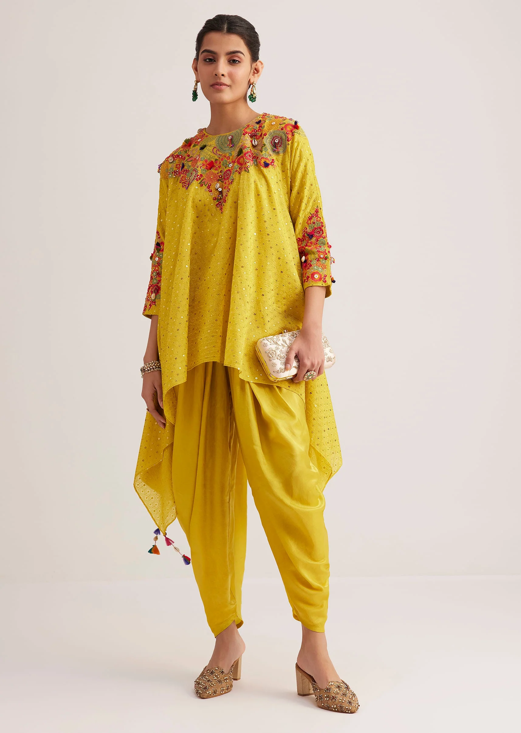 9719-yellow-silk-kurta-dhoti-set-with-resham-embroidery-and-tassel-details-1.webp Yellow Silk Kurta Dhoti Set With Resham Embroidery And Tassel Details
