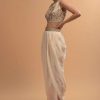 Ivory Tulip Dhoti And Crop Top Set With Embossed Floral Embroidery And High Neckline